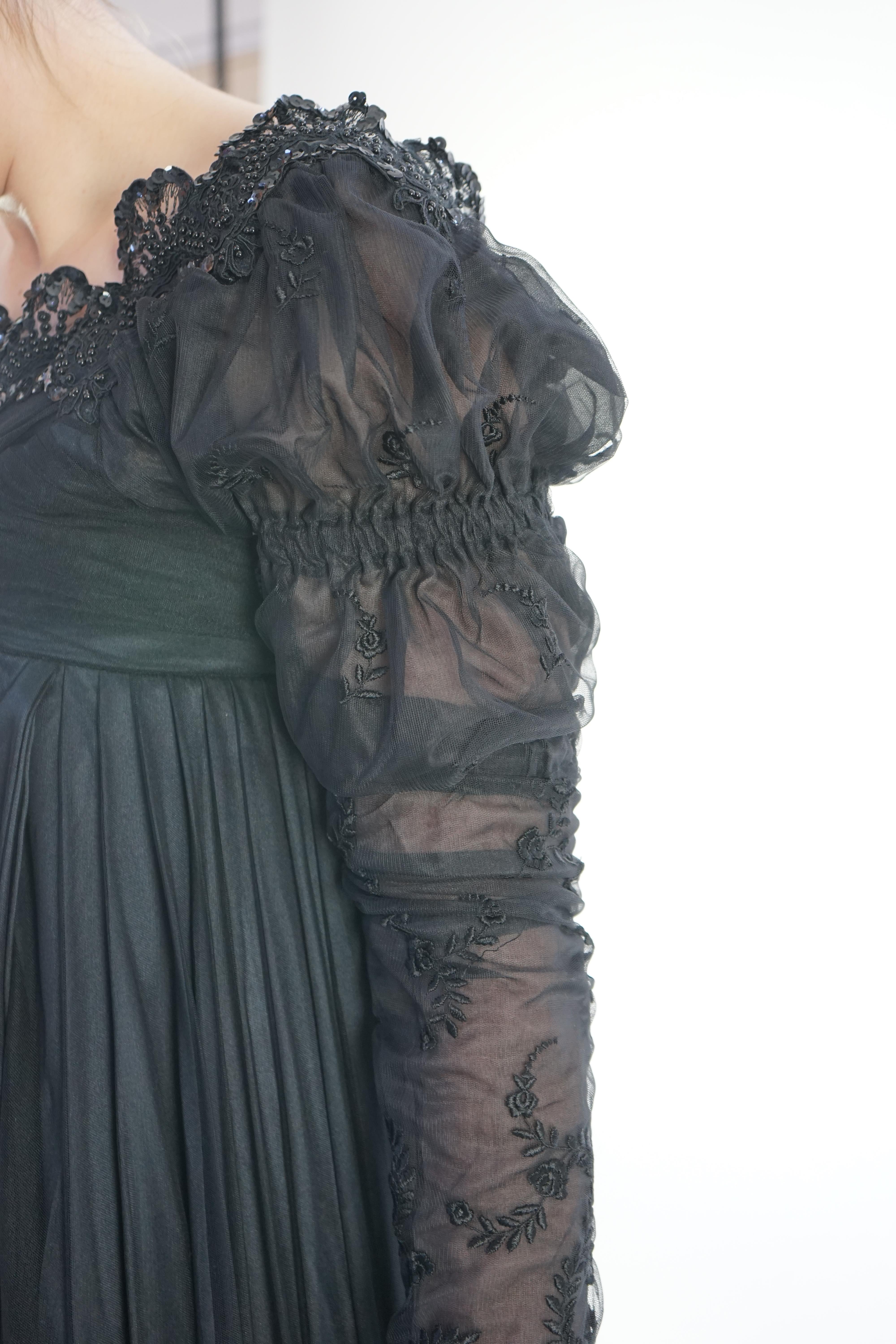 A fine quality lady's black satin, chiffon and jet trimmed Regency style evening dress with long train, lacing on jet stomacher. Ex English National Opera (unlabelled) 'Don Giovanni'